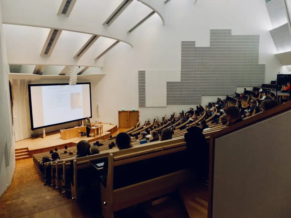 Lecture being delivered by a professor in a large lecture hall